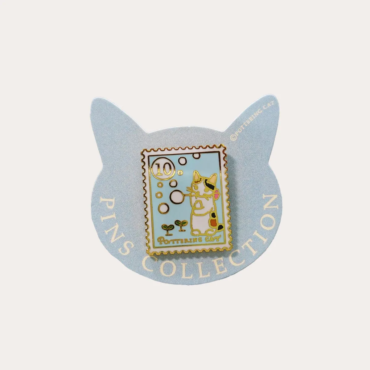 Cat Blowing Bubbles Stamp Enamel Pin
